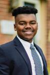 Young man in a dark suit